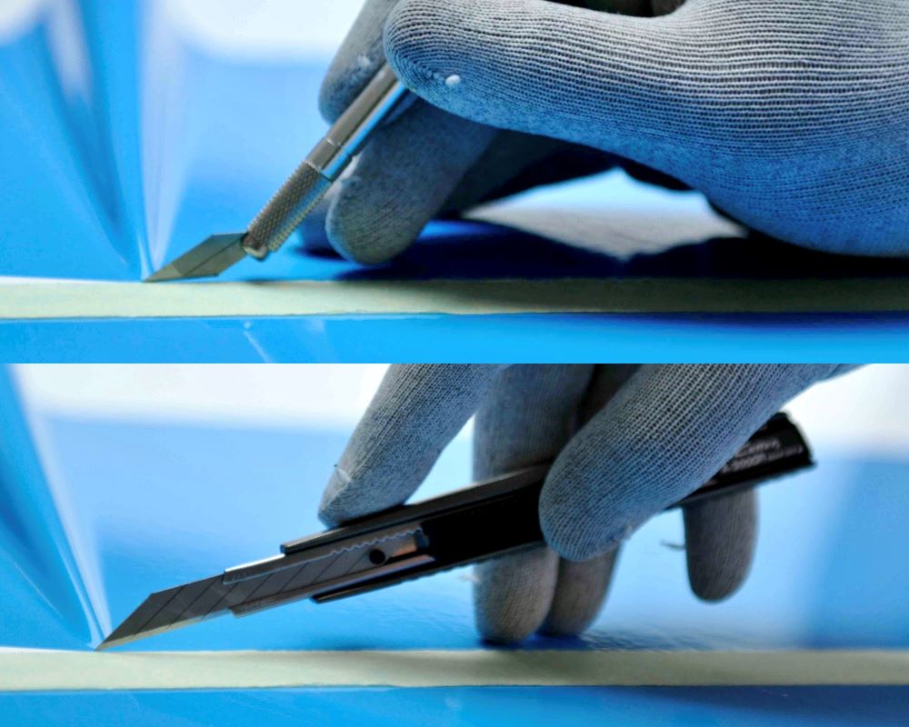 Foto van 2 soorten meshouders met breekmesjes die soms gebruikt worden bij de afwerking van folies tijdens de Appcademy signmaker cursus