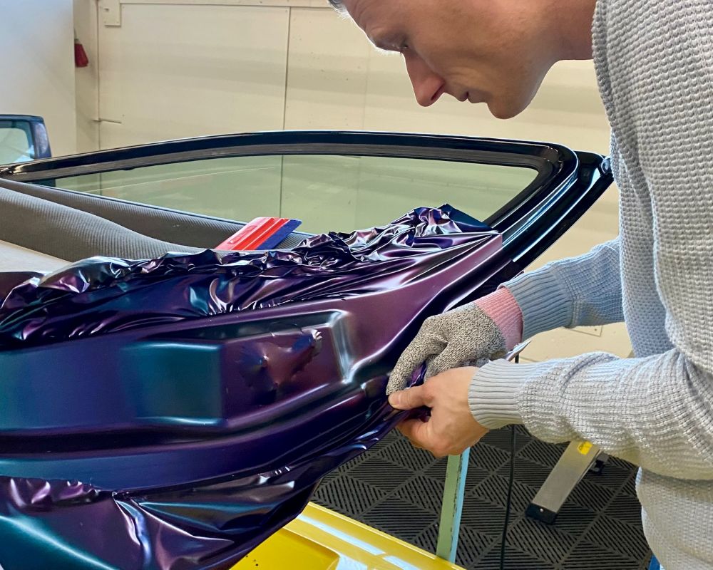 Cursist wrapt binnenzijde portier tijdens Appcademy Masterclass